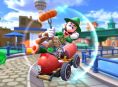 Luigi äter churros på Plaza Mayor i Mario Kart Tour